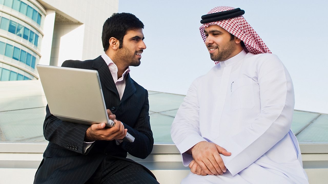 Two businessmen talking