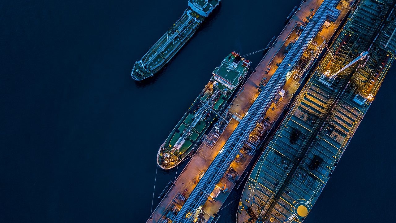 A cargo ship docked from a birds eye view