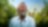 Smiling man with a beard in front of trees with an outline of the Generating shareholder value graph