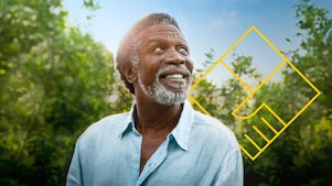 Smiling man with a beard in front of trees with an outline of the Generating shareholder value graph