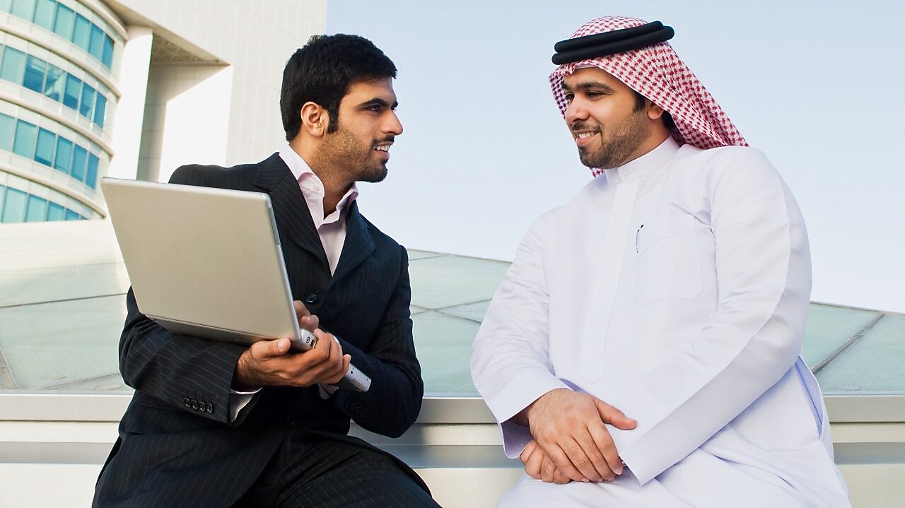 Two businessmen talking