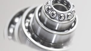 Metal cylinder with ball bearings in