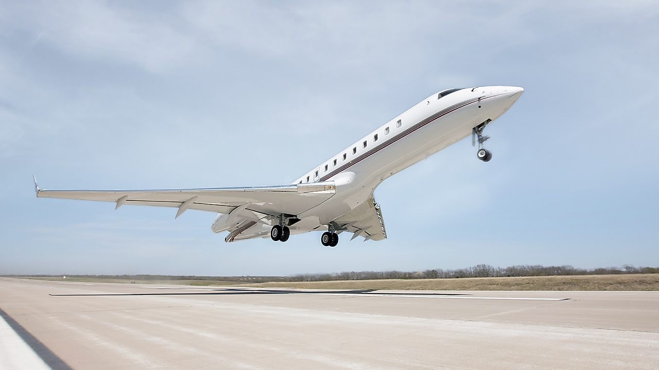 Jet plane taking off from a runway at an airport
