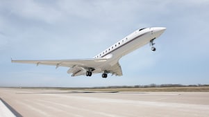 Jet plane taking off from a runway at an airport