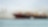 large tanker at sea loaded with container crates