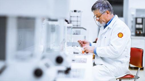 Senior male researcher carrying out scientific research in a lab