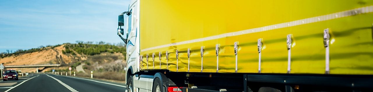 Yellow truck on the road