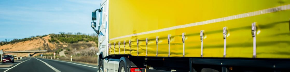 Yellow truck on the road