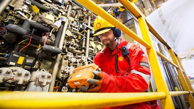 Employee from TACIT working in a plant room