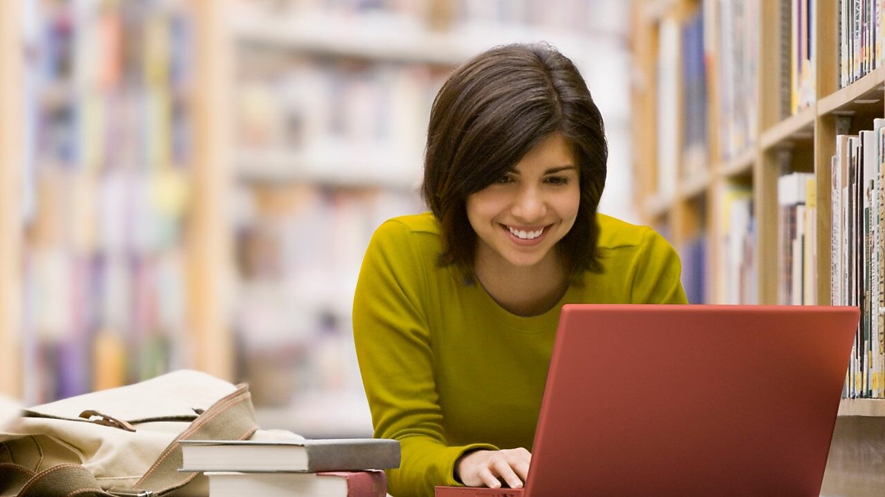 Woman looking at her laptop screen