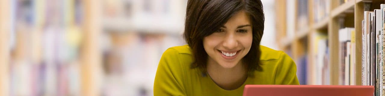 Woman looking at her laptop screen