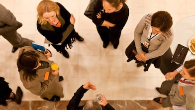 Aerial view of group of employees talking