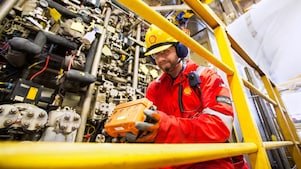 Employee from TACIT working in a plant room