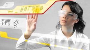 Woman working with a digital touch screen.