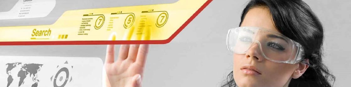 Woman working with a digital touch screen.