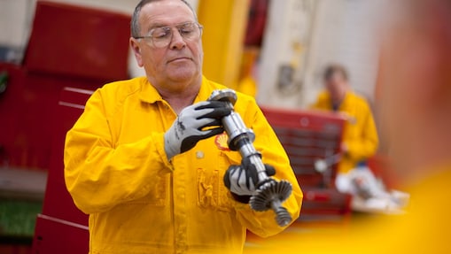 Worker inspecting a piece of equipment
