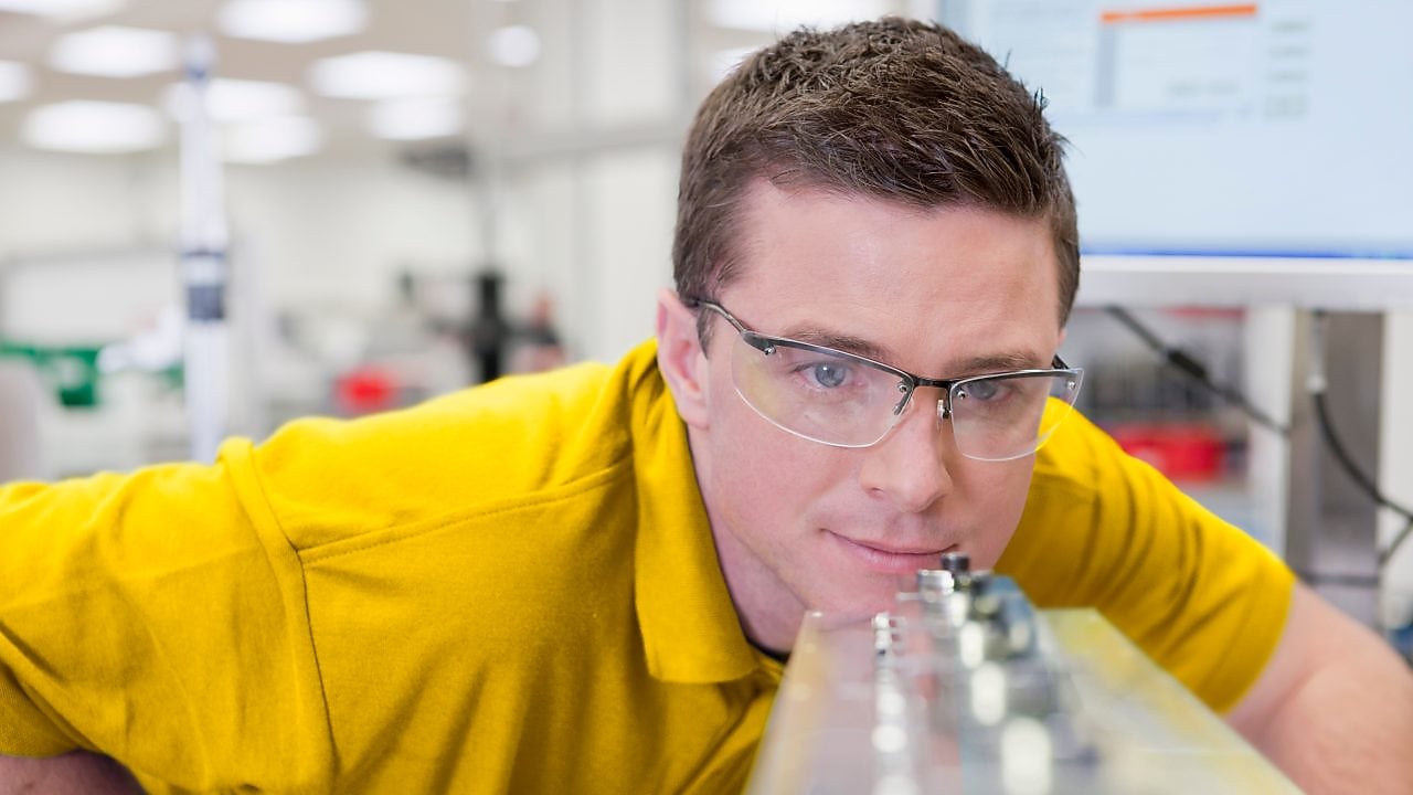 Man looking a instrument in the laboratory