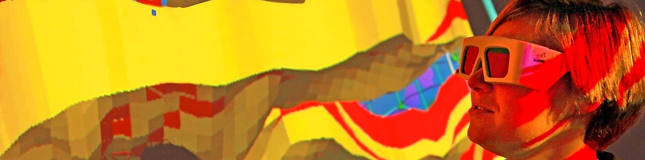 lady wtaching screen with 3d glasses