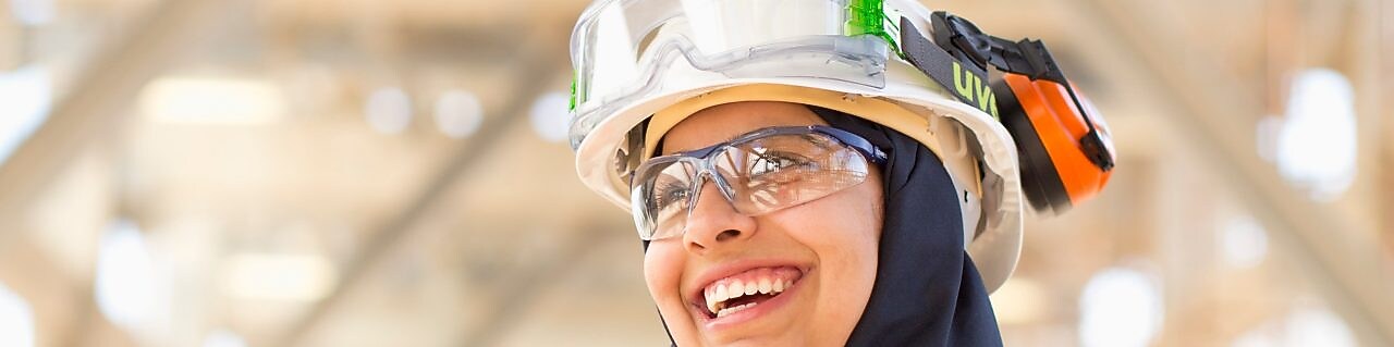 Lady in red dress at work place