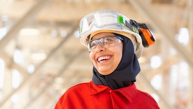 Lady in red dress at work place