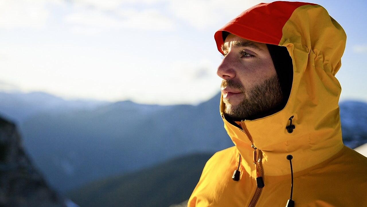 Headshot of a young man at the top of Cypress Peak,Climbing Cypress Peak