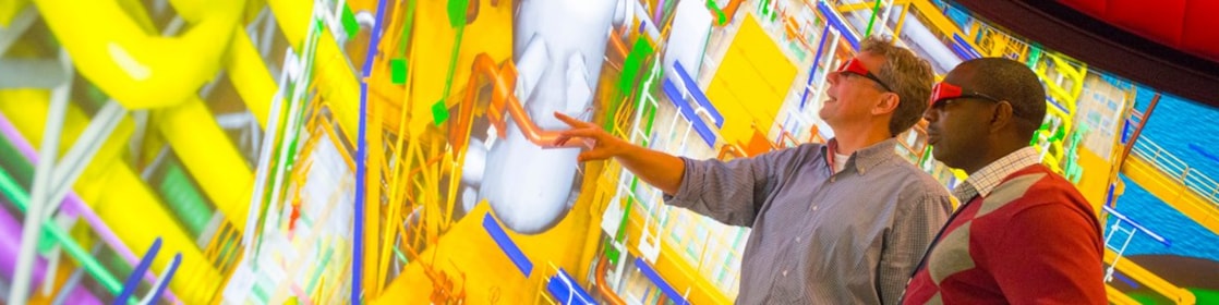 two man watching big screen with 3d glasses