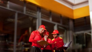 3 Shell employees discussing
